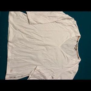 Burberry shirt size XL. V neck novacheck ribbing on sides. Small tear. See photo